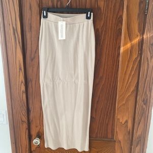 Full length ribbed skirt, color grey size small. Brand new with tag